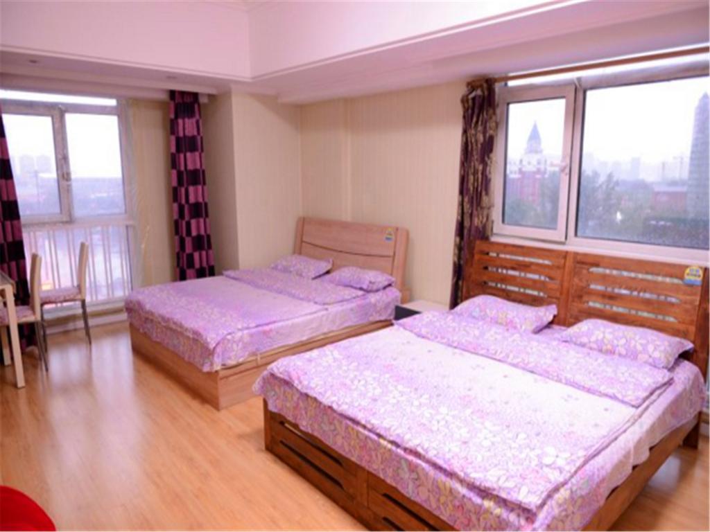 Green Express Apartment Harbin West Railway Station Quarto foto